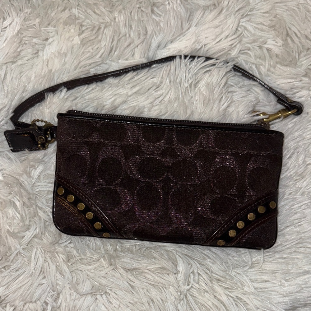 Elegant Brown Coach Clutch with Gold Accents